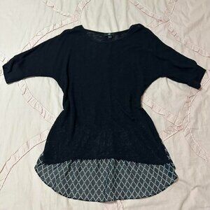 IZ Byer sheer, lightweight sweater blouse with pattern hem on back.